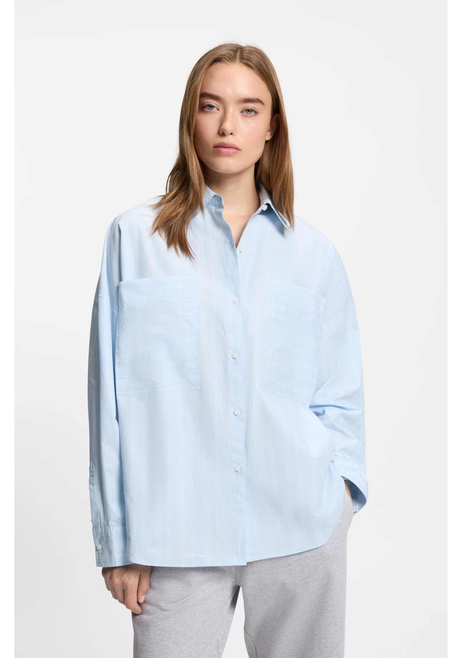hbeu50553358_987_350 Relaxed-fit blouse in striped cotton poplin - Image 1