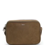 Crossbody bag in monogram-embossed suede