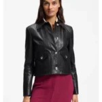 Leather jacket with polished logo buttons