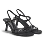 Strappy sandals in leather with asymmetric heel